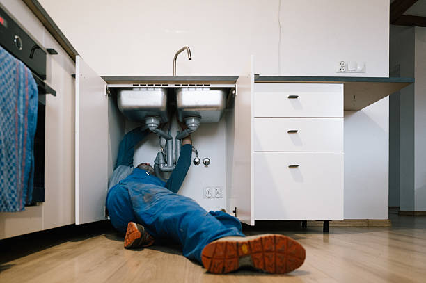 Professional Plumbing technician working in Clinton, MO